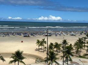 Guilhermina pé na areia Vista Espetacular